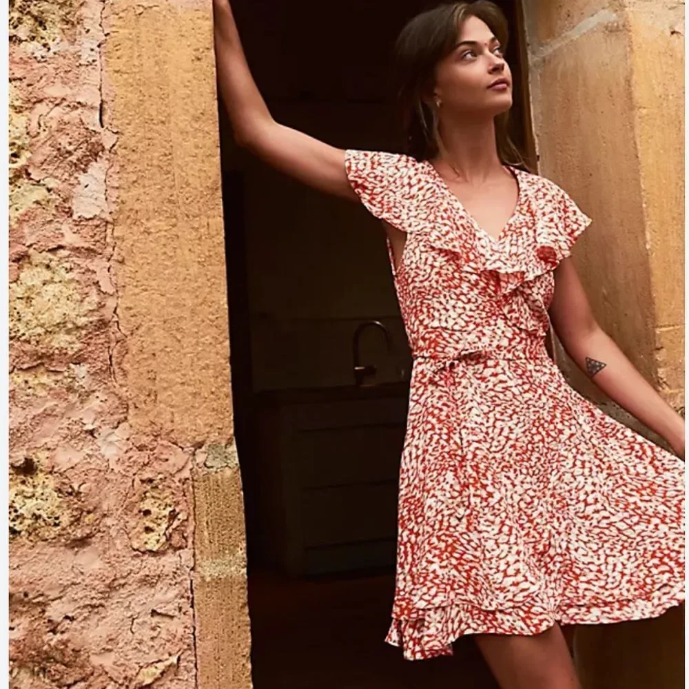 Free People French Quarter Wrap Mini Dress orange and white animal small